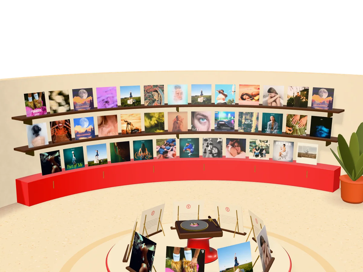 The record wall: every goodtwin release on curved shelves above a red cabinet
