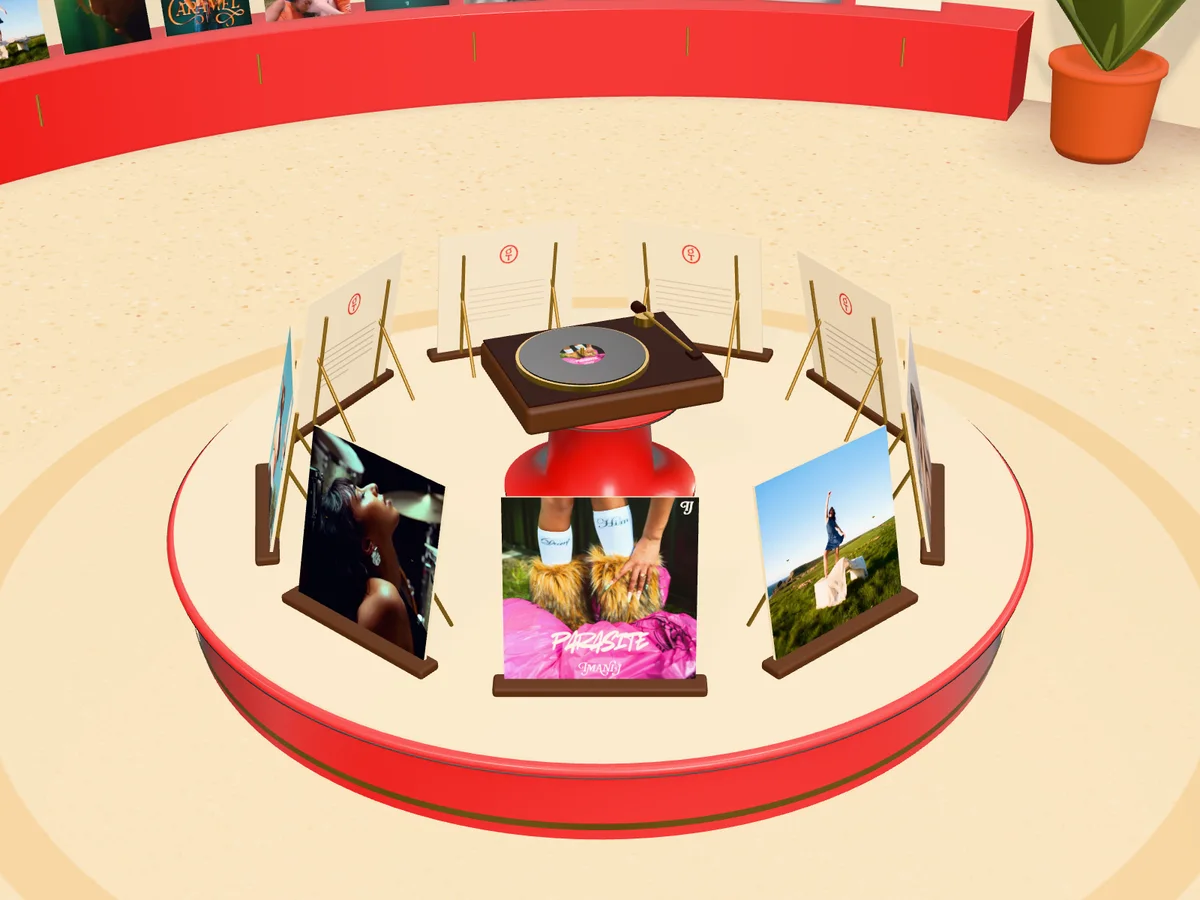 Inside the house: the latest record from each artist on a red rotunda around a turntable